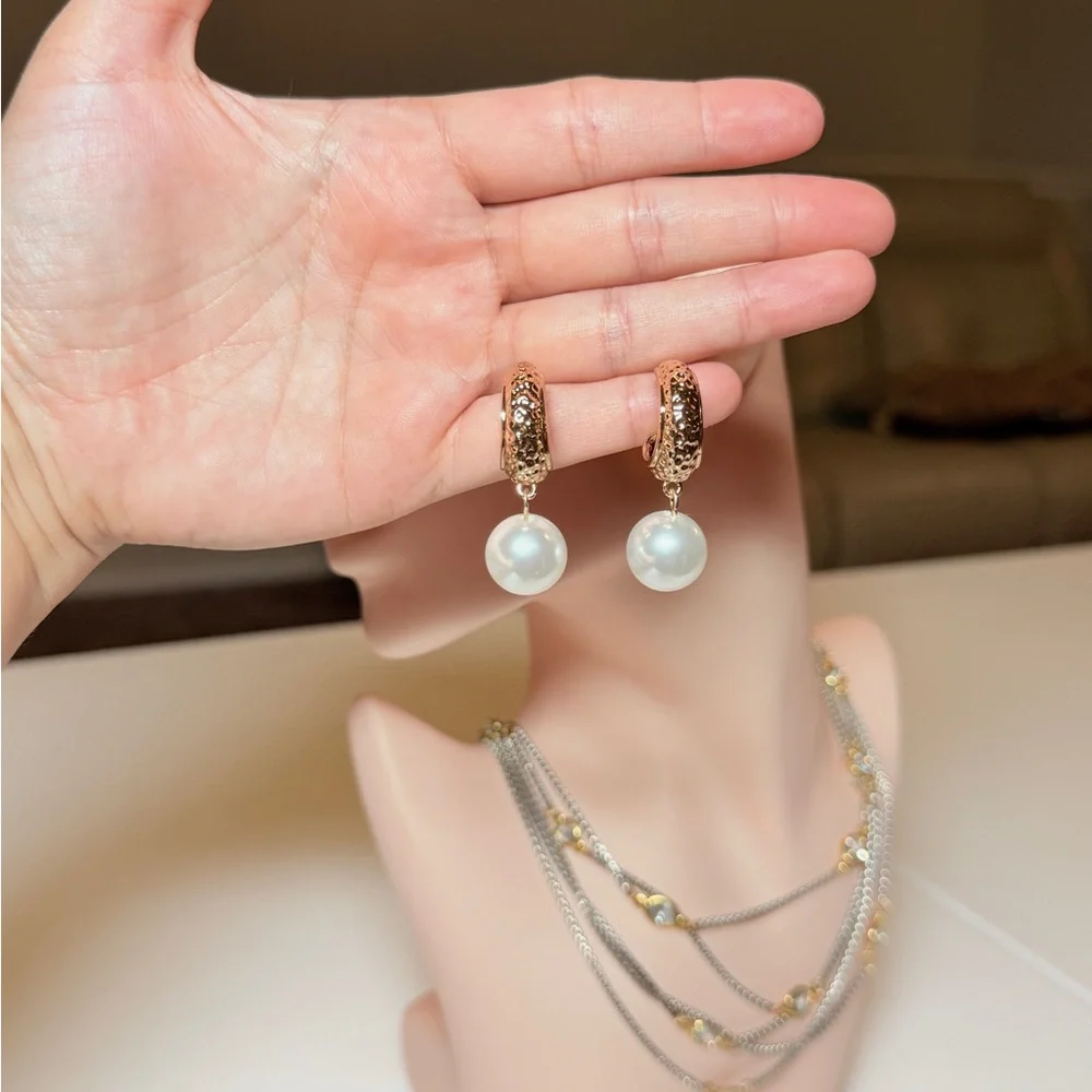 Anthropologie elegant gold